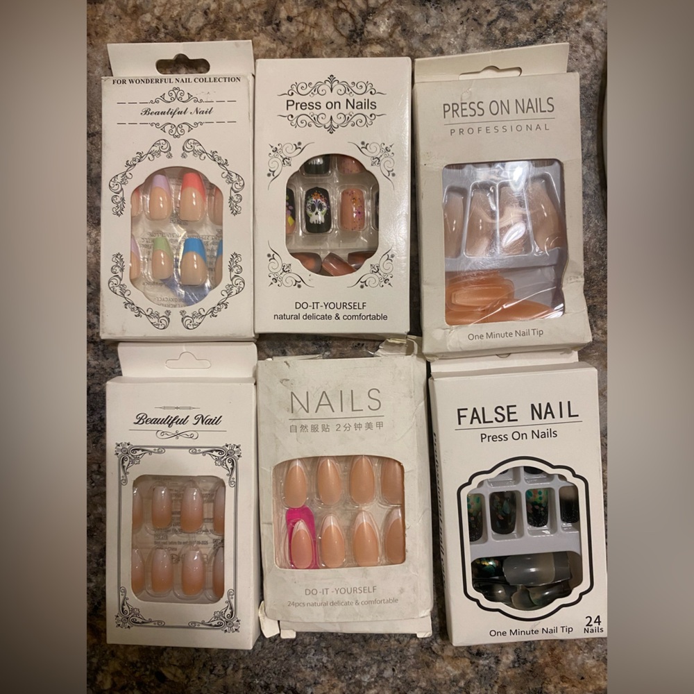 Variety of nails of different shapes, colors, and patterns/designs!